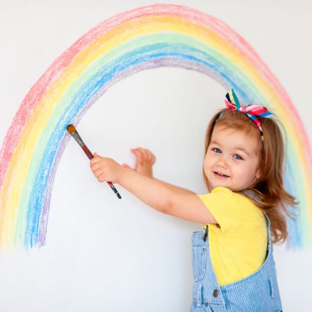 Super,Cute,Little,Girl,Drawing,Rainbow,On,White,Wall,At