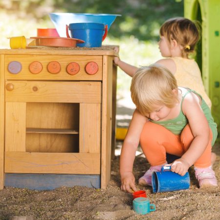 Little,Children,Playing,Outdoors,In,Play,Kitchen