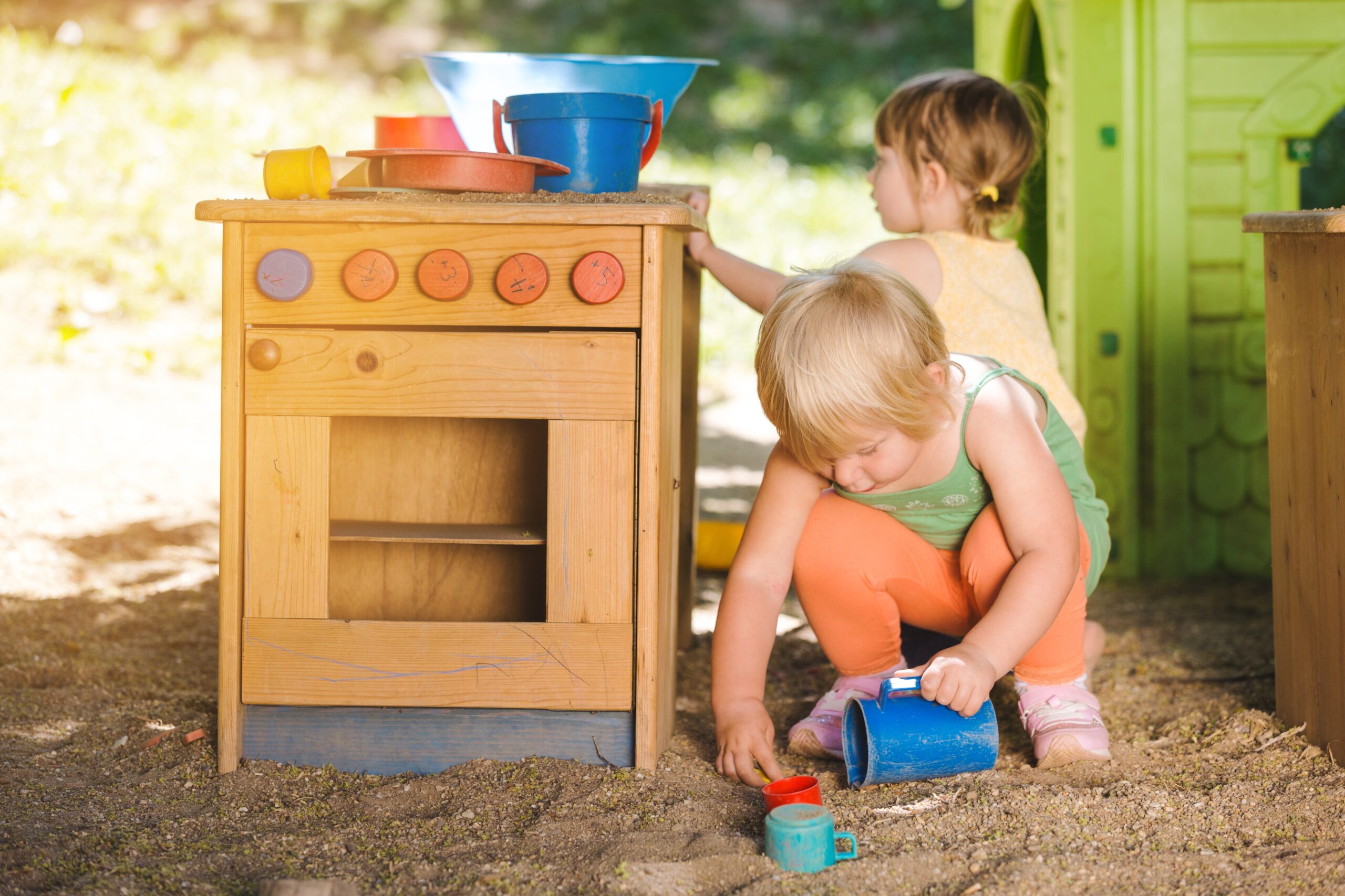 Little,Children,Playing,Outdoors,In,Play,Kitchen