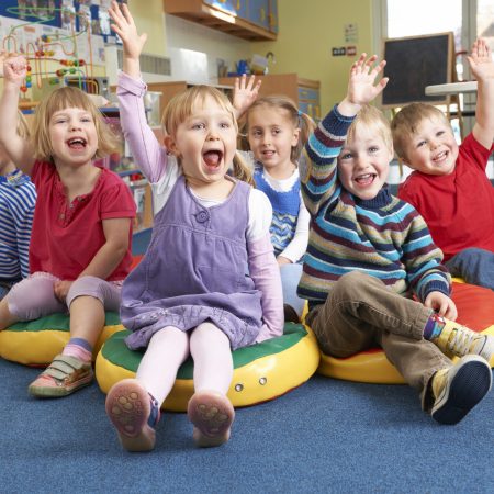 Group,Of,Pre,School,Children,Answering,Question,In,Classroom